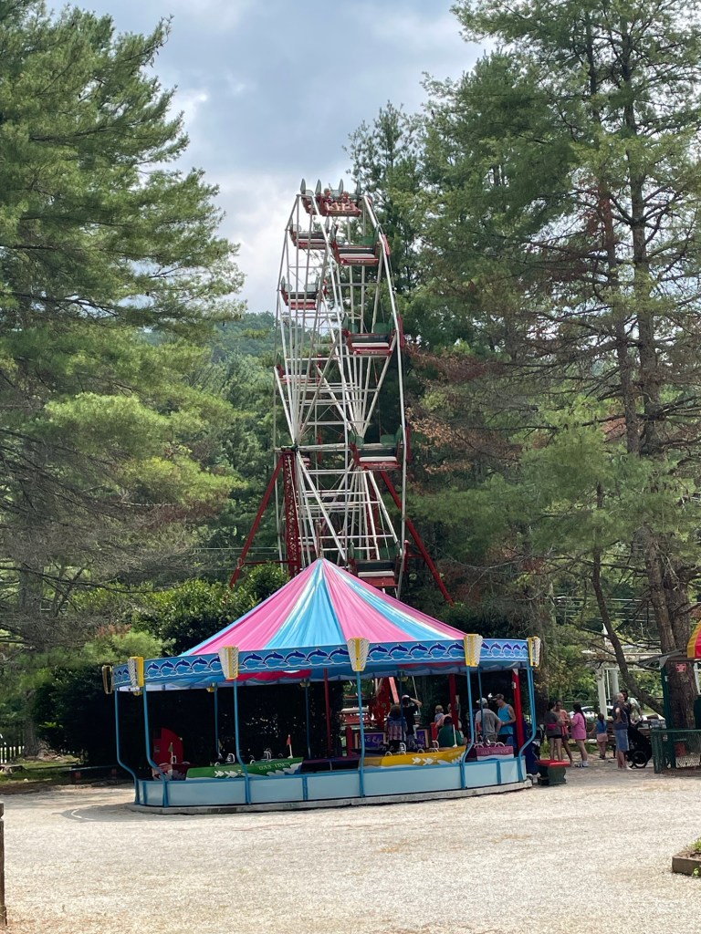 The Ferris wheel and kiddie boat ride at Santa's Land