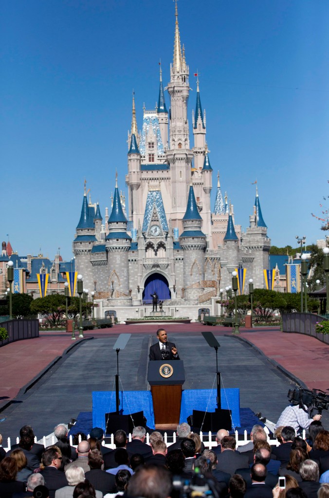 President Obama in front of the Disney World Castle
