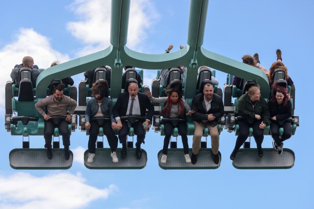 Sir Edward Davey, Leader of the Liberal Democrats, rides a Scremin' Swing