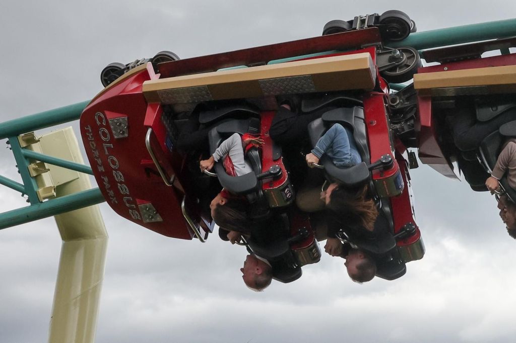 Sir Edward Davey rides a roller coaster