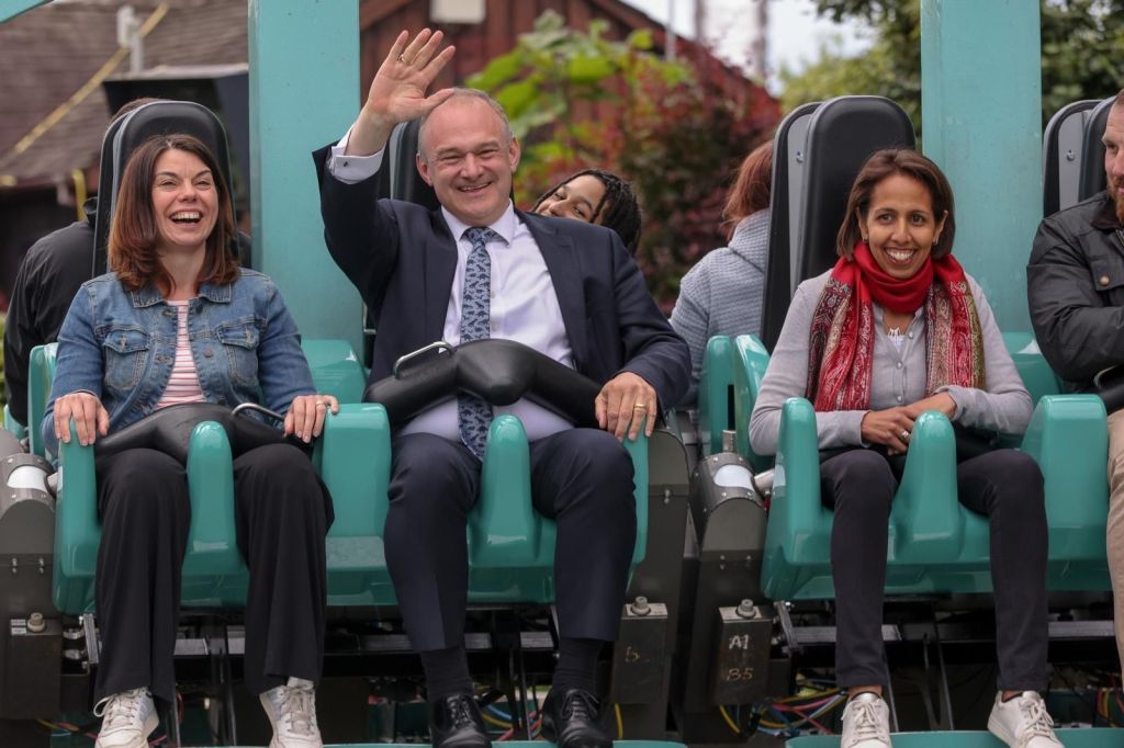 Sir Edward Davey rides a Screamin' Swing