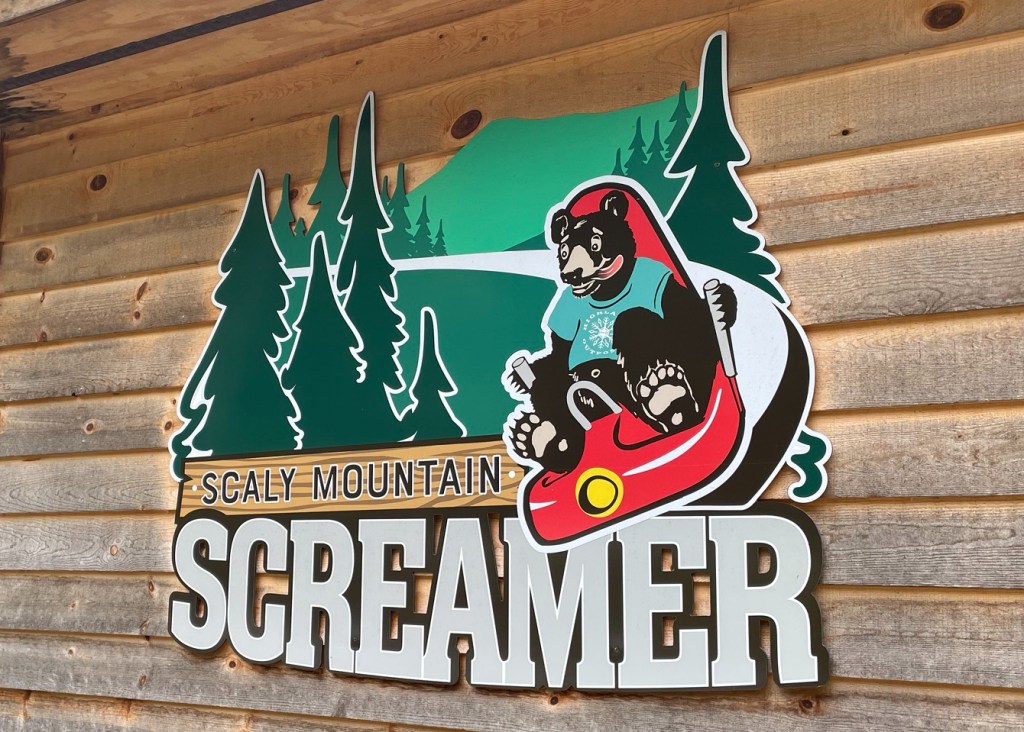 Scaly Mountain Screamer Logo of bear by trees