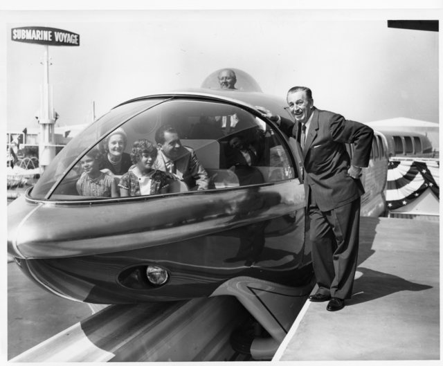 Richard Nixon and his family prepare to ride the Monorail at Disneyland in Anaheim, California