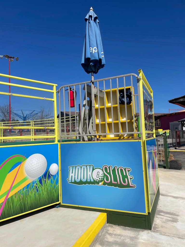 Sign for Hook & Slice flat ride at Fun Stop Atlanta