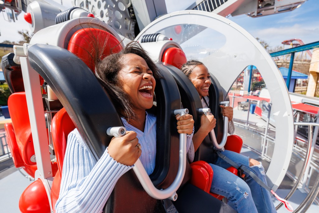 Riders on CYBORG Cyber Revolutionat Six Flags Fiesta Texas