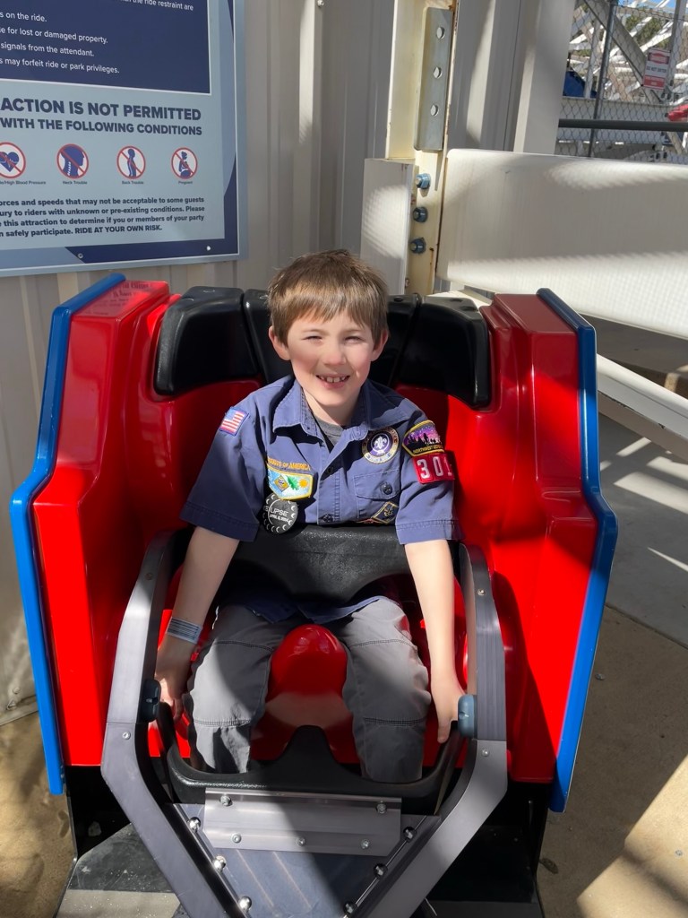 Cub scout in test seat front of ArieForce One at Fun Spot Atlanta