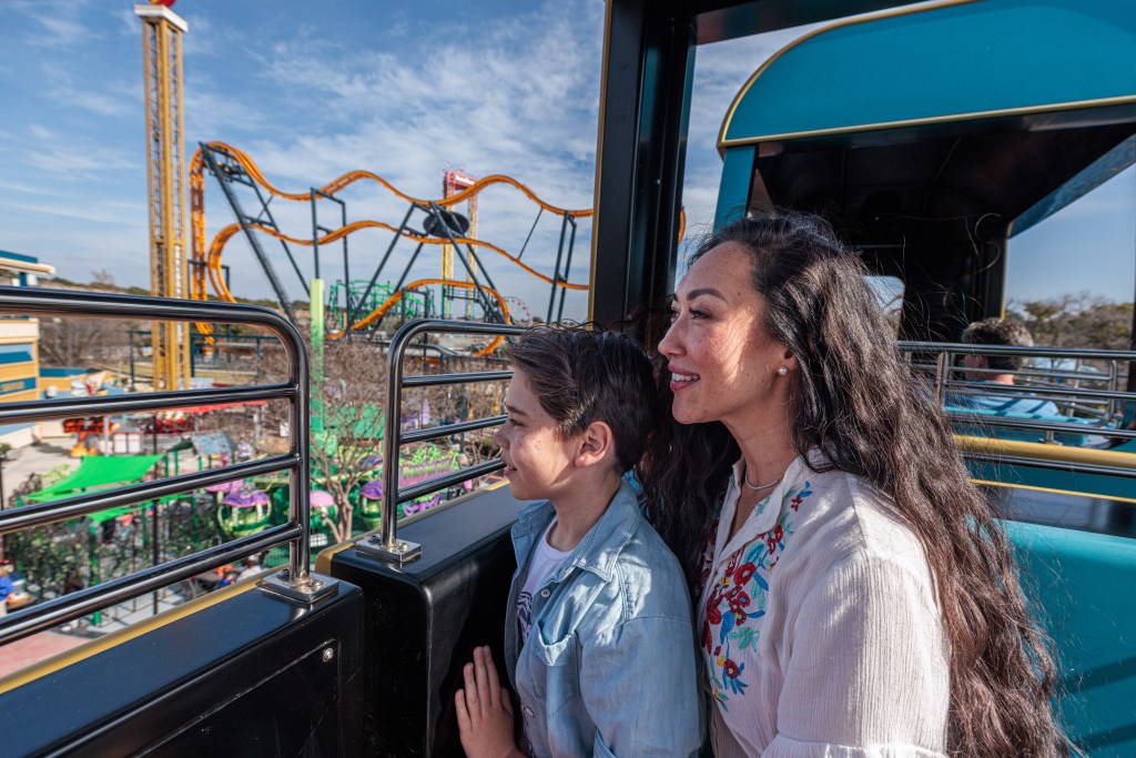 Riders on METROPOLIS™ Transit Authority at Six Flags Fiesta Texas