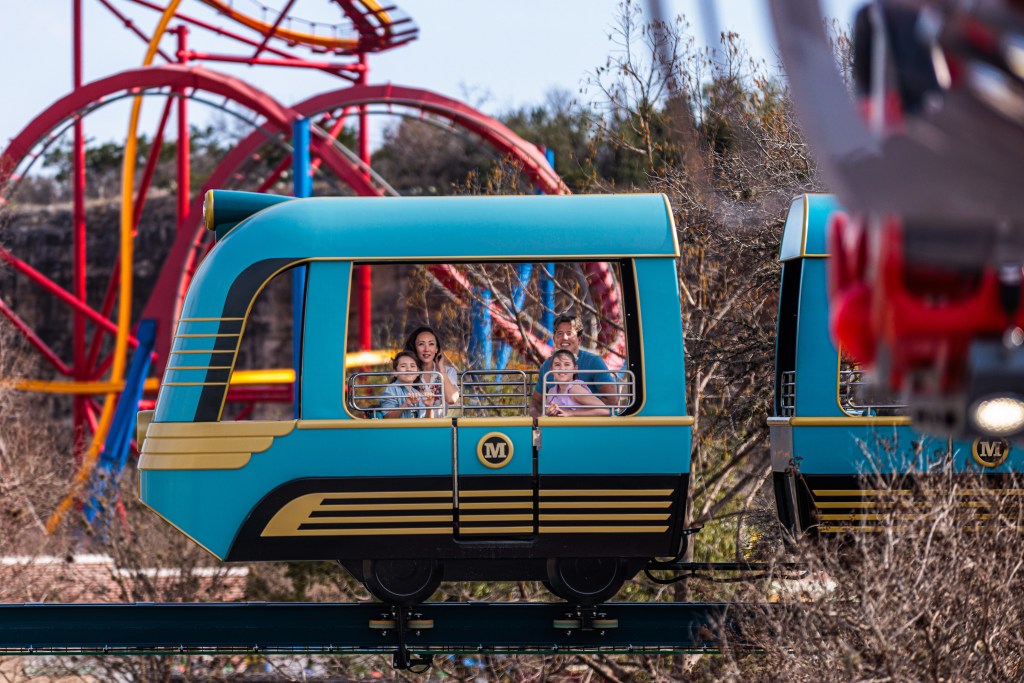Riders on METROPOLIS™ Transit Authority at Six Flags Fiesta Texas
