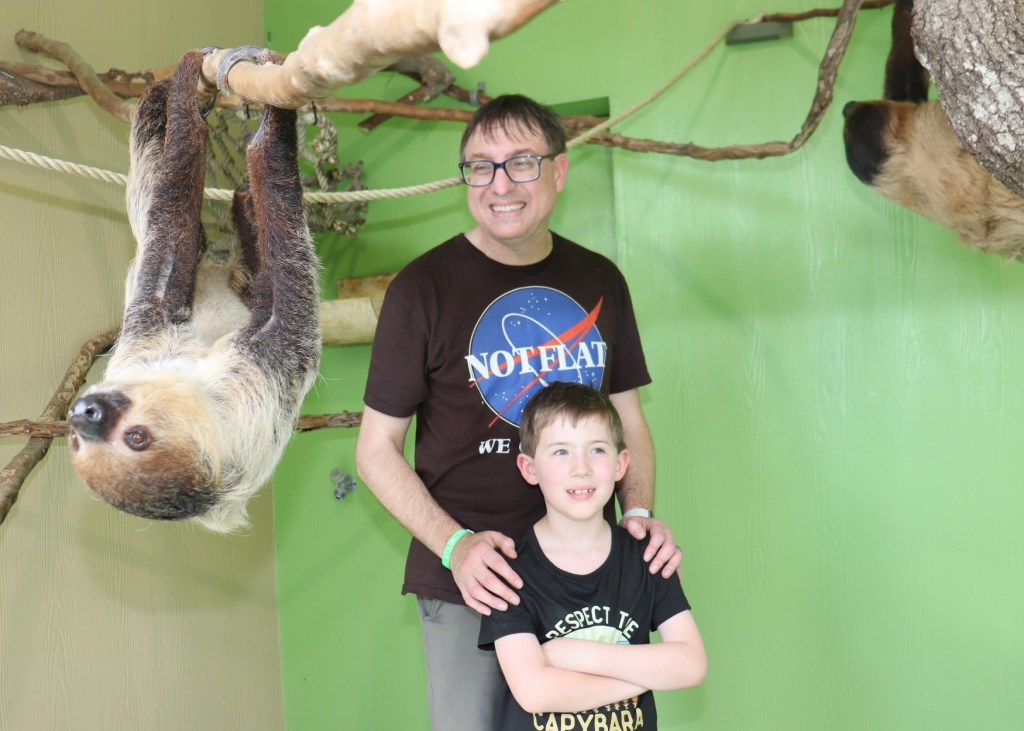 humans with sloths at Wild Adventures
