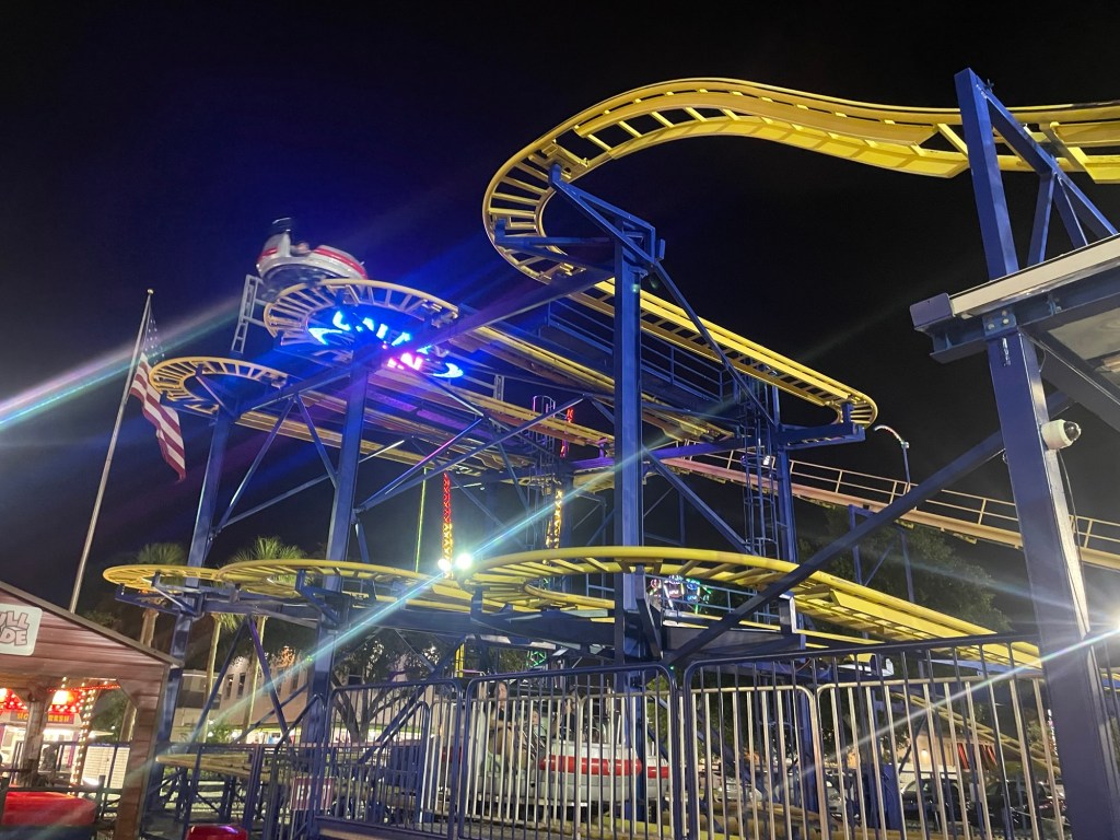 Galaxy Spin roller coaster at night at Fun Spot Kissimmee