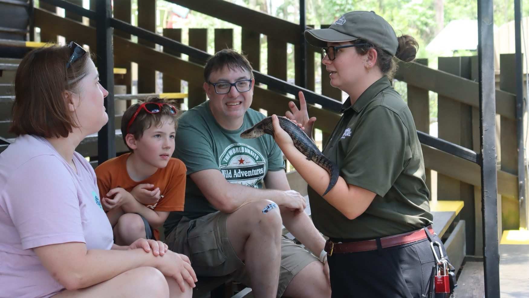 Family at Wild Adventures Swamp Tour with skink