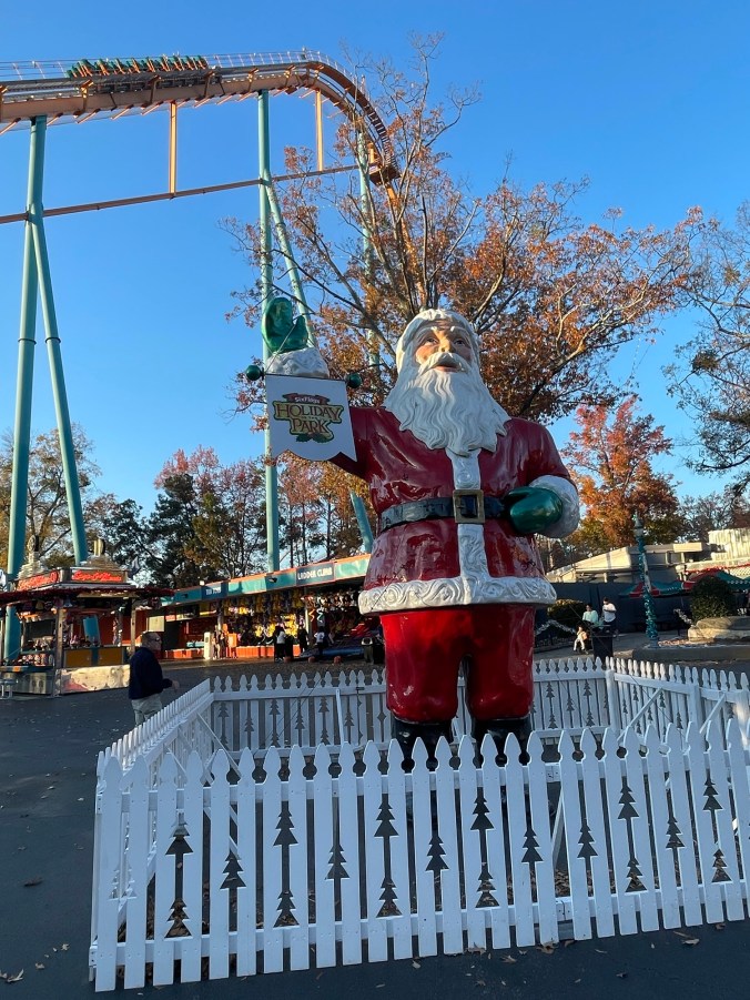 Santa in front of Goliath roller coaster at Six Flags Over Georgia Holiday in the Park